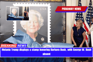 Melania Trump displays a stamp honoring Barbara Bush, with George W. Bush absent
